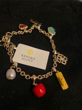 Kendra Scott Gold Charm bracelet with NYC logos
